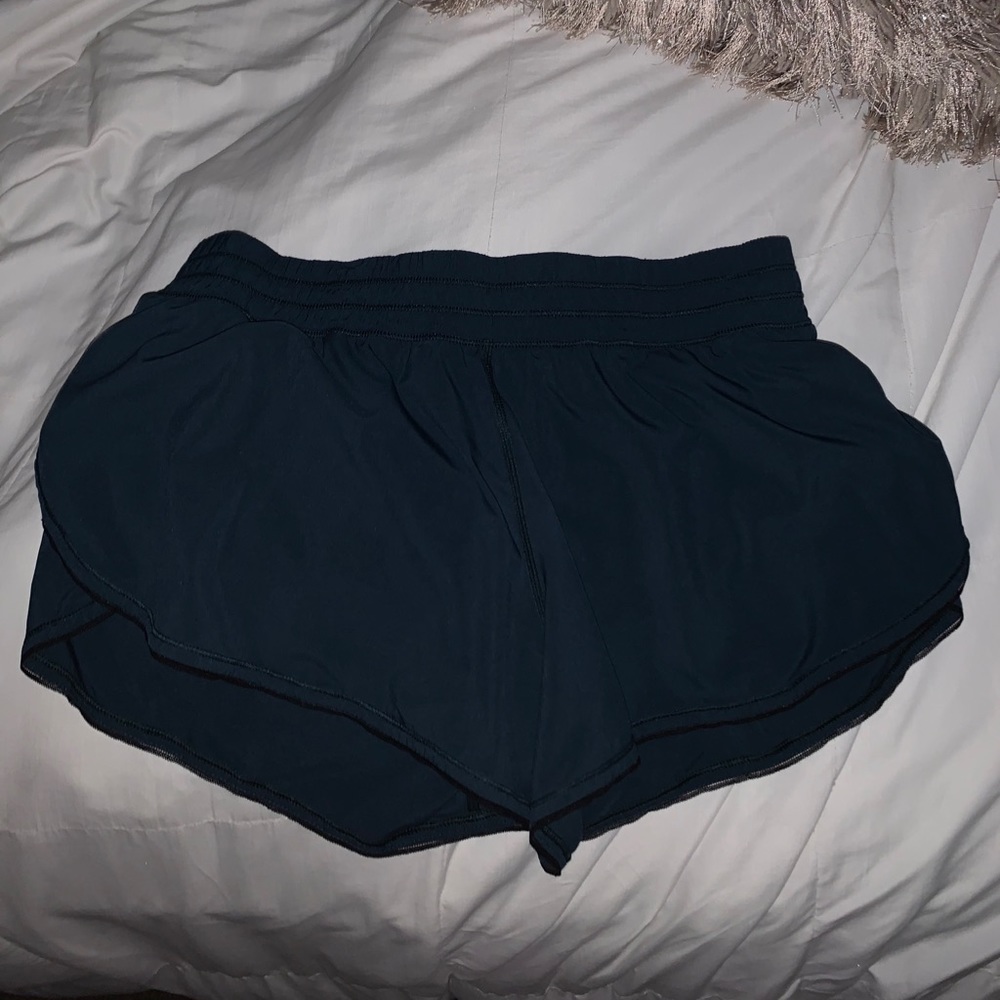 dark/ emerald green lululemon shorts
